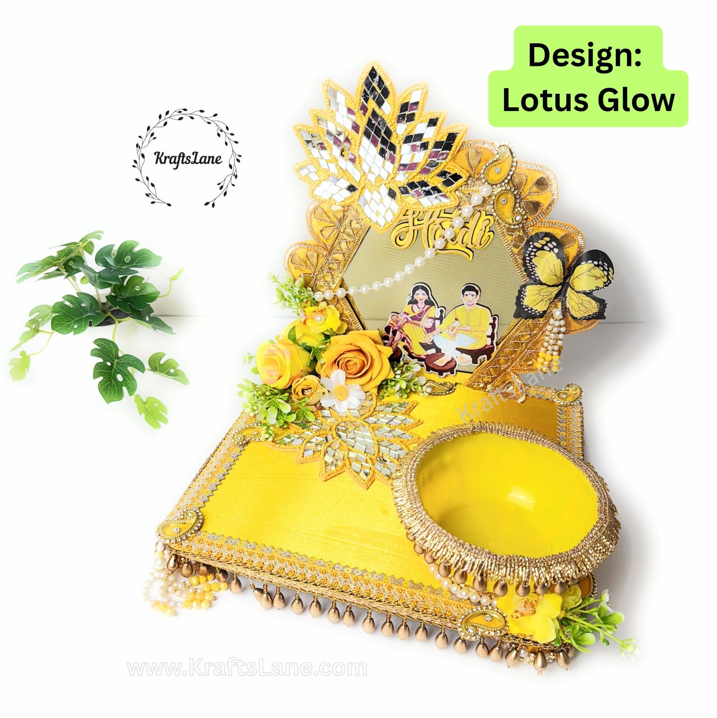 Indian bridal haldi tray with yellow floral decor and ritual accessories
